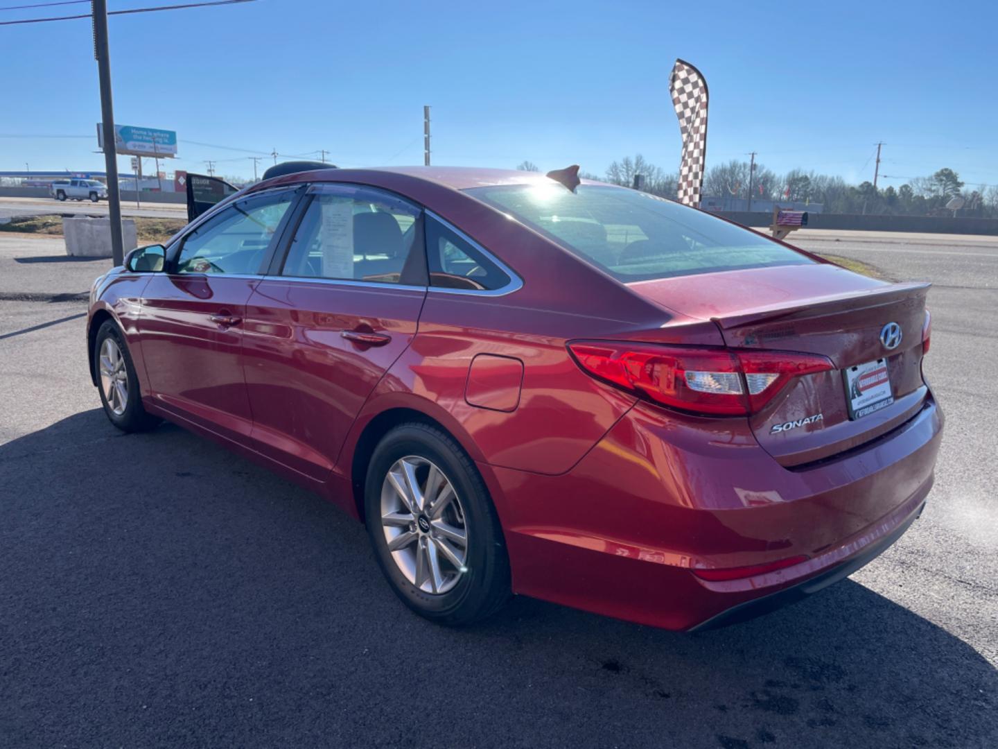 2016 Maroon Hyundai Sonata (5NPE24AF6GH) with an 4-Cyl, 2.4 Liter engine, Auto, 6-Spd w/Shiftronic and Drive Mode Select transmission, located at 8008 Warden Rd, Sherwood, AR, 72120, (501) 801-6100, 34.830078, -92.186684 - Photo#5